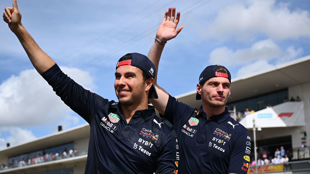 AUSTIN, TEXAS - OCTOBER 23: Max Verstappen of the Netherlands and Oracle Red Bull Racing and Sergio Perez of Mexico and Oracle Red Bull Racing wave to the crowd from the drivers parade prior to the F1 Grand Prix of USA at Circuit of The Americas on October 23, 2022 in Austin, Texas.