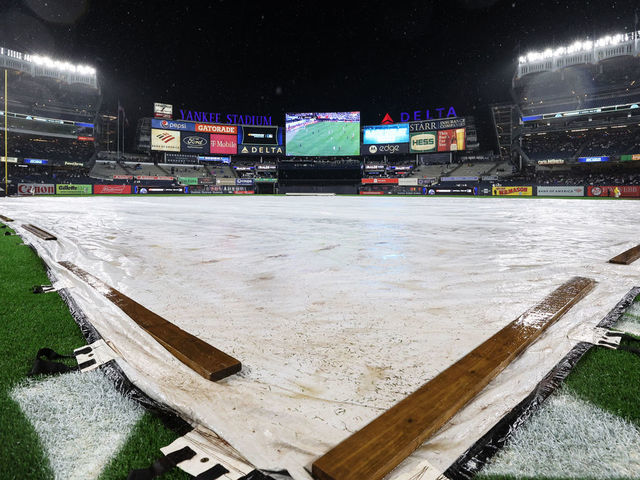 Red Sox rally after lengthy rain delay to defeat Astros