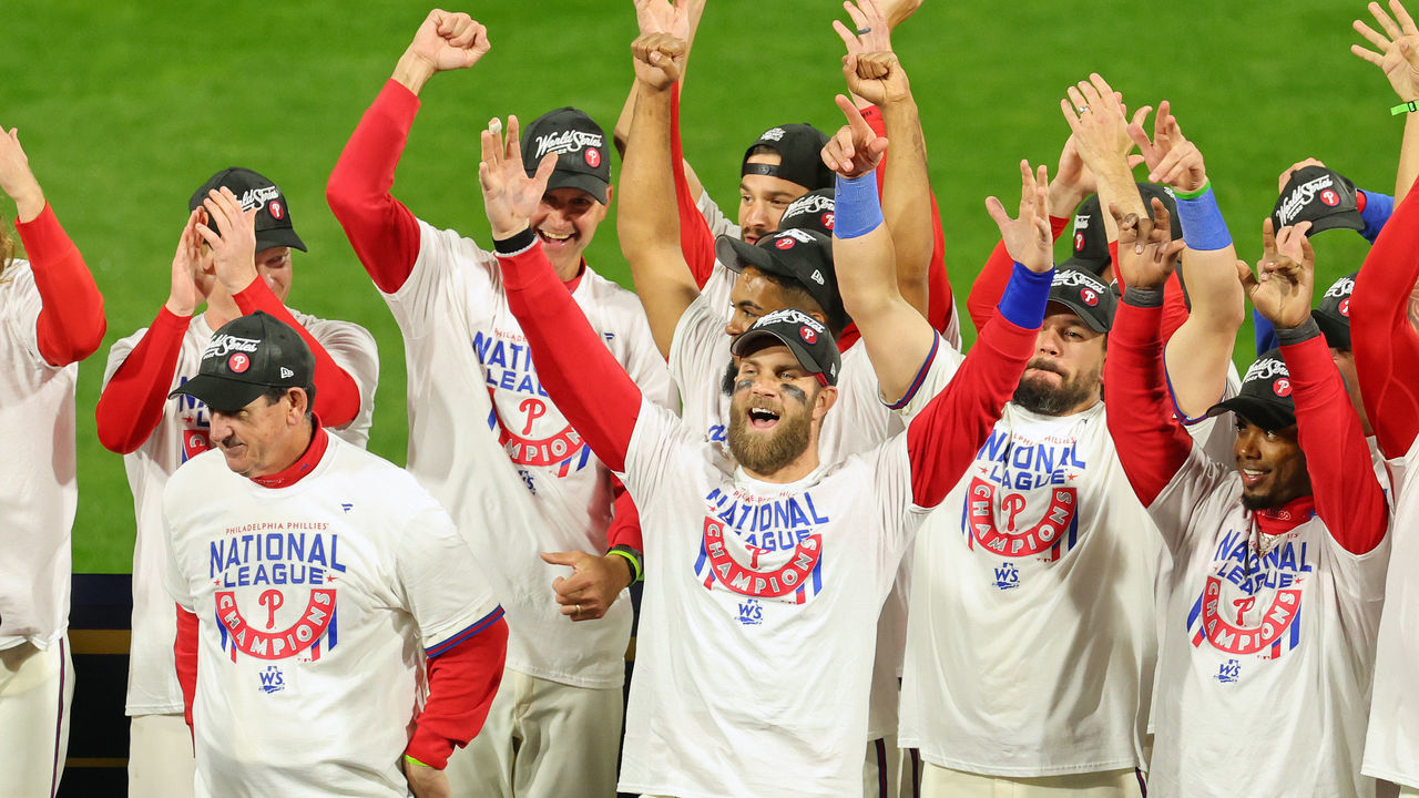 PHILADELPHIA, PENNSYLVANIA - OCTOBER 23: Bryce Harper #3 of the Philadelphia Phillies celebrates with teammates after defeating the San Diego Padres in game five to win the National League Championship Series at Citizens Bank Park on October 23, 2022 in Philadelphia, Pennsylvania.