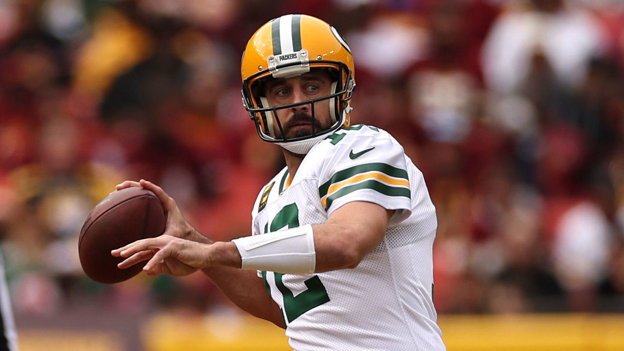 LANDOVER, MARYLAND - OCTOBER 23: Aaron Rodgers #12 of the Green Bay Packers throws the ball during the first quarter of the game against the Washington Commanders at FedExField on October 23, 2022 in Landover, Maryland.