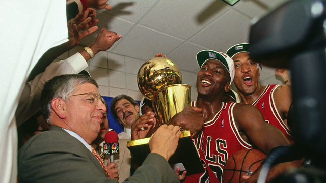 PHOENIX - JUNE 20: NBA Commissioner David Stern presents Michael Jordan and the Chicago Bulls the championship trophy after the Bulls defeated the Phoenix Suns in Game Six of the 1993 NBA Finals on June 20, 1993 at America West Arena in Phoenix, Arizona. Mandatory Copyright Notice: Copyright 1993 NBAE