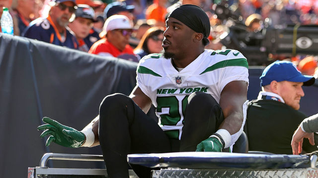 DENVER, CO - OCTOBER 23: New York Jets running back Breece Hall gets carted off the field after getting injured during a NFL game between the New York Jets and the Denver Broncos on October 23, 2022 at Empower Field at Mile High in Denver, CO.