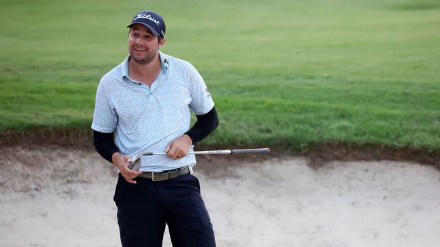 JEDDAH, SAUDI ARABIA - OCTOBER 16: Peter Uihlein of Smash GC reacts to his shot from a bunker on the 18th green, the third playoff hole, during day three of the LIV Golf Invitational - Jeddah at Royal Greens Golf & Country Club on October 16, 2022 in King Abdullah Economic City, Saudi Arabia.
