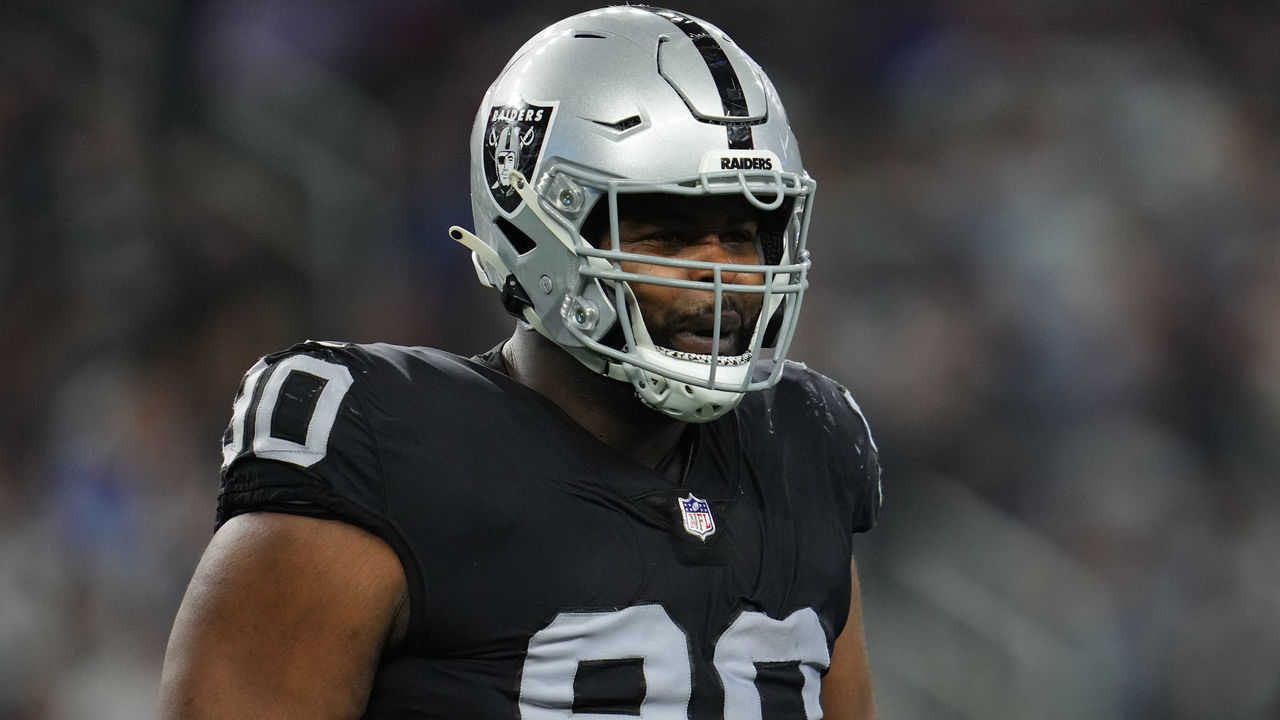 ARLINGTON, TEXAS - NOVEMBER 25: Johnathan Hankins #90 of the Las Vegas Raiders celebrates against the Dallas Cowboys during an NFL game at AT&T Stadium on November 25, 2021 in Arlington, Texas.