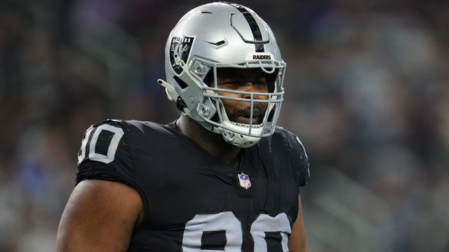 ARLINGTON, TEXAS - NOVEMBER 25: Johnathan Hankins #90 of the Las Vegas Raiders celebrates against the Dallas Cowboys during an NFL game at AT&T Stadium on November 25, 2021 in Arlington, Texas.