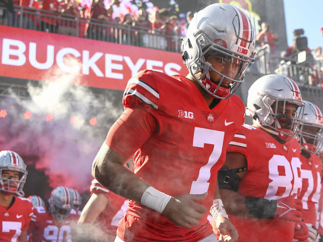 COLUMBUS, OHIO - OCTOBER 22: Quarterback C.J. Stroud #7 of the Ohio State Buckeyes leads his team onto the field before playing the Iowa Hawkeyes at Ohio Stadium on October 22, 2022 in Columbus, Ohio.