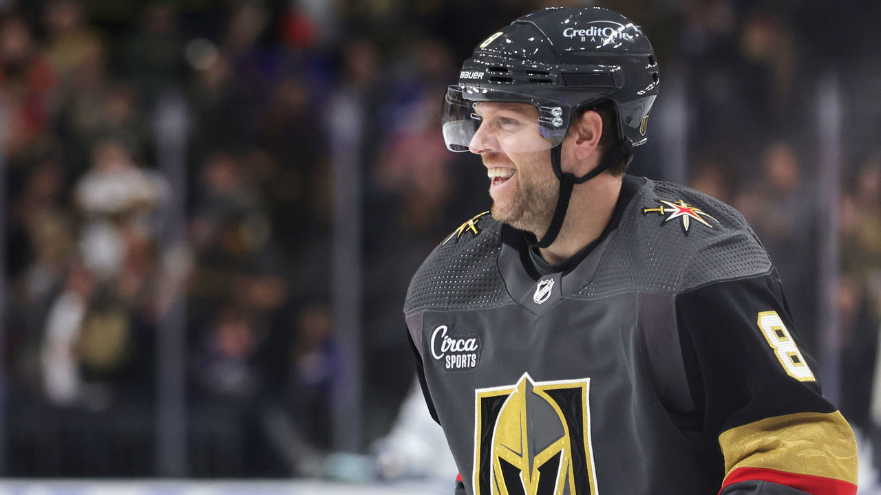 LAS VEGAS, NEVADA - OCTOBER 24: Phil Kessel #8 of the Vegas Golden Knights reacts after assisting Nicolas Roy #10 on a first-period power-play goal against the Toronto Maple Leafs as Kessel plays in his his 989th consecutive NHL game, tying Keith Yandle for the longest “Ironman” streak in league history at T-Mobile Arena on October 24, 2022 in Las Vegas, Nevada.