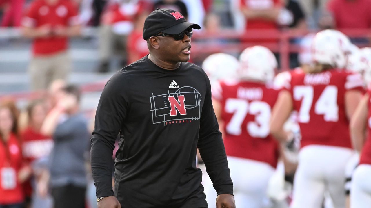 LINCOLN, NE - OCTOBER 01: Interim head coach Mickey Joseph of the Nebraska Cornhuskers watches the team warm up before the game against the Indiana Hoosiers at Memorial Stadium on October 1, 2022 in Lincoln, Nebraska.