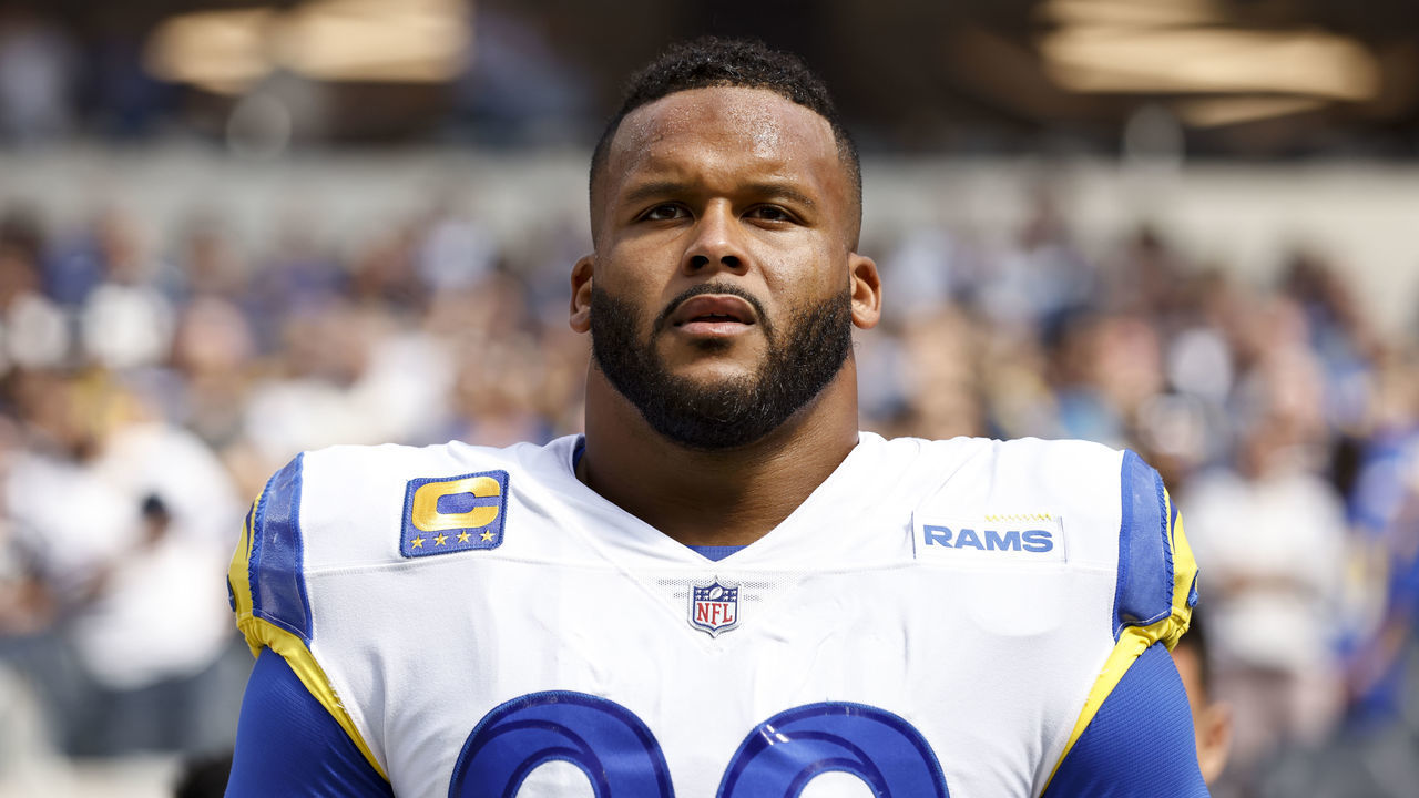 INGLEWOOD, CALIFORNIA - OCTOBER 09: Aaron Donald #99 of the Los Angeles Rams looks on during the national anthem prior to an NFL football game against the Dallas Cowboys at SoFi Stadium on October 09, 2022 in Inglewood, California.