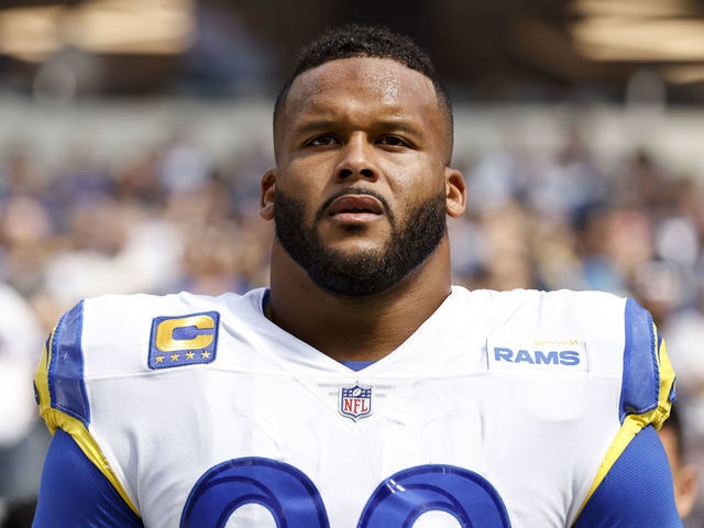 INGLEWOOD, CALIFORNIA - OCTOBER 09: Aaron Donald #99 of the Los Angeles Rams looks on during the national anthem prior to an NFL football game against the Dallas Cowboys at SoFi Stadium on October 09, 2022 in Inglewood, California.