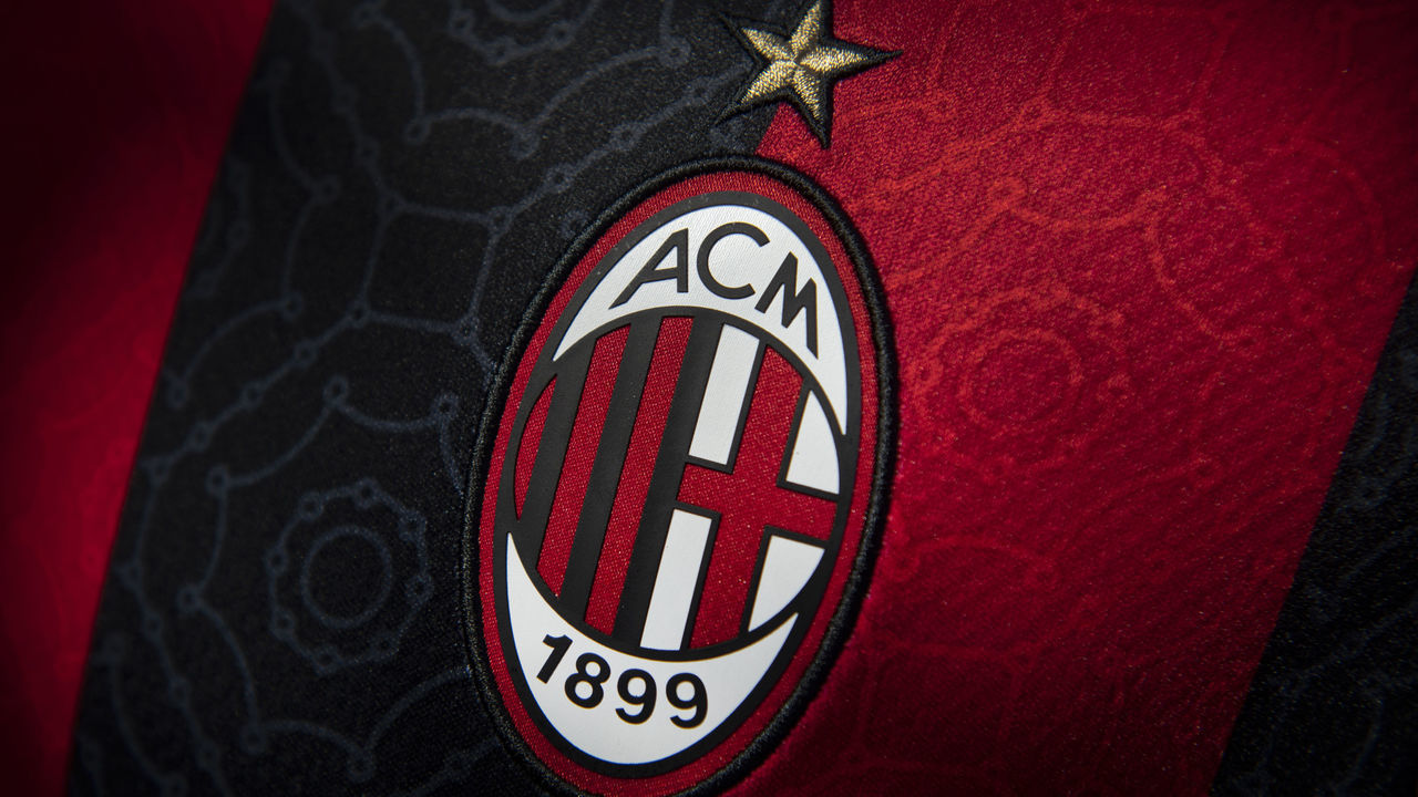 MANCHESTER, ENGLAND - MAY 19: The AC Milan home shirt displaying the club badge on May 19, 2021 in Manchester, United Kingdom.