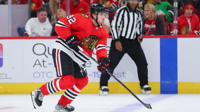 CHICAGO, IL - OCTOBER 01: Chicago Blackhawks defenseman Nicolas Beaudin (92) skates with the puck in action during a game between the Detroit Red Wings and the Chicago Blackhawks on October 1, 2022 at the United Center in Chicago, IL.