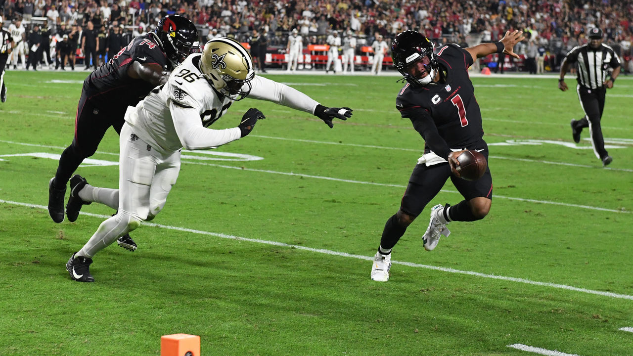 GLENDALE, ARIZONA - OCTOBER 20: Kyler Murray #1 of the Arizona Cardinals attempts to avoid a tackle by Carl Granderson #96 of the New Orleans Saints at State Farm Stadium on October 20, 2022 in Glendale, Arizona.
