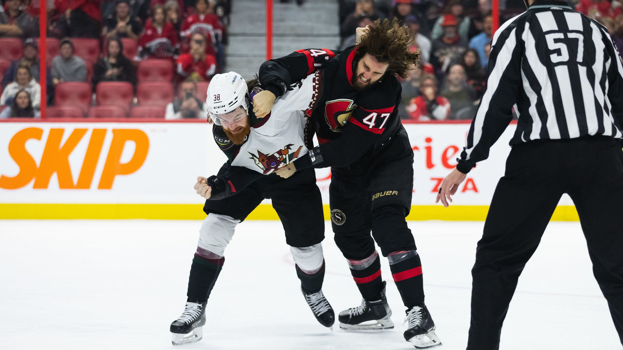 OTTAWA, ON - OCTOBER 22: Arizona Coyotes Center Liam O'Brien (38) fights Ottawa Senators Center Mark Kastelic (47) during second period National Hockey League action between the Arizona Coyotes and Ottawa Senators on October 22, 2022, at Canadian Tire Centre in Ottawa, ON, Canada.