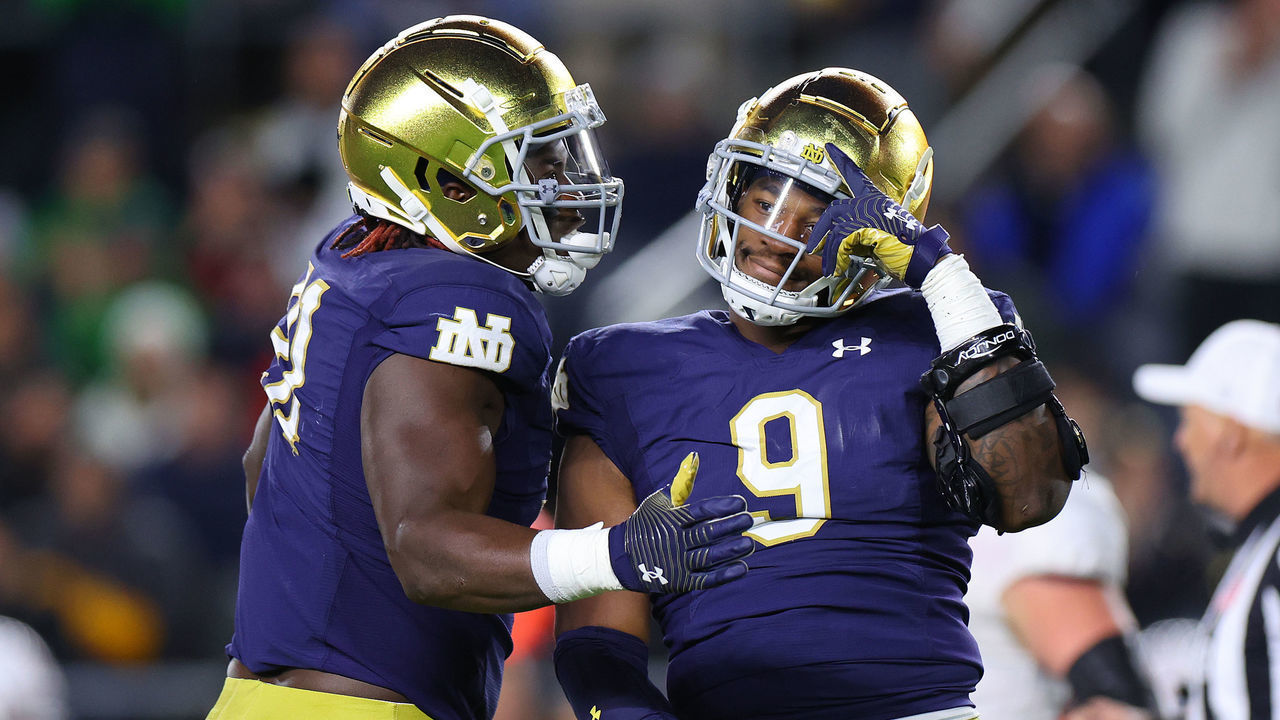 SOUTH BEND, INDIANA - OCTOBER 15: Justin Ademilola #9 of the Notre Dame Fighting Irish celebrates a sack against the Stanford Cardinal during the first half at Notre Dame Stadium on October 15, 2022 in South Bend, Indiana.