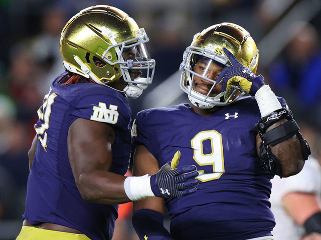 SOUTH BEND, INDIANA - OCTOBER 15: Justin Ademilola #9 of the Notre Dame Fighting Irish celebrates a sack against the Stanford Cardinal during the first half at Notre Dame Stadium on October 15, 2022 in South Bend, Indiana.