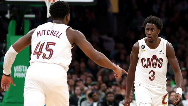 BOSTON, MASSACHUSETTS - OCTOBER 28: Donovan Mitchell #45 of the Cleveland Cavaliers celebrates with Caris LeVert #3 after scoring against the Boston Celtics qduring the second half at TD Garden on October 28, 2022 in Boston, Massachusetts.