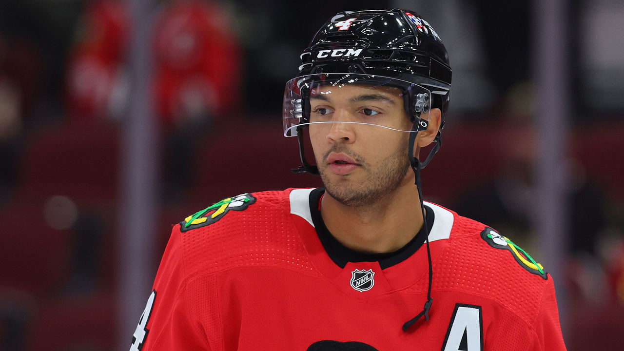 CHICAGO, ILLINOIS - OCTOBER 21: Seth Jones #4 of the Chicago Blackhawks looks on prior to the game against the Detroit Red Wings at United Center on October 21, 2022 in Chicago, Illinois.
