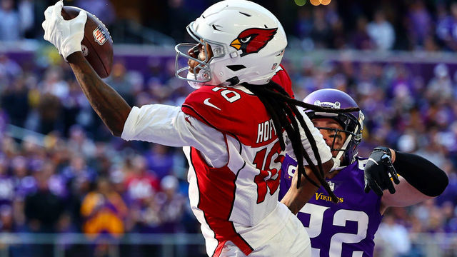 MINNEAPOLIS, MINNESOTA - OCTOBER 30: DeAndre Hopkins #10 of the Arizona Cardinals catches the ball for a touchdown as Harrison Smith #22 of the Minnesota Vikings defends during the second quarter at U.S. Bank Stadium on October 30, 2022 in Minneapolis, Minnesota.