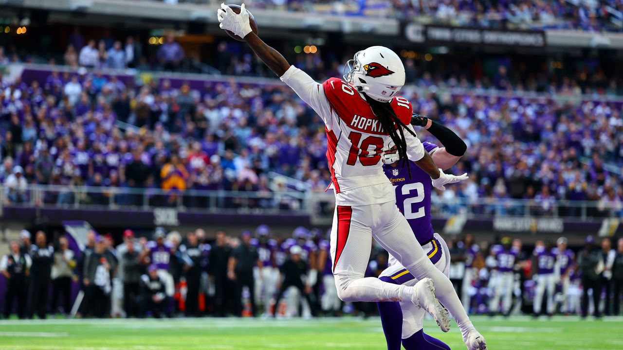 MINNEAPOLIS, MINNESOTA - OCTOBER 30: DeAndre Hopkins #10 of the Arizona Cardinals catches the ball for a touchdown as Harrison Smith #22 of the Minnesota Vikings defends during the second quarter at U.S. Bank Stadium on October 30, 2022 in Minneapolis, Minnesota.
