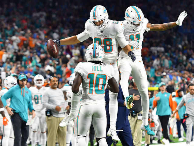 Tyreek Hill of the Miami Dolphins celebrates a touchdown catch News  Photo - Getty Images