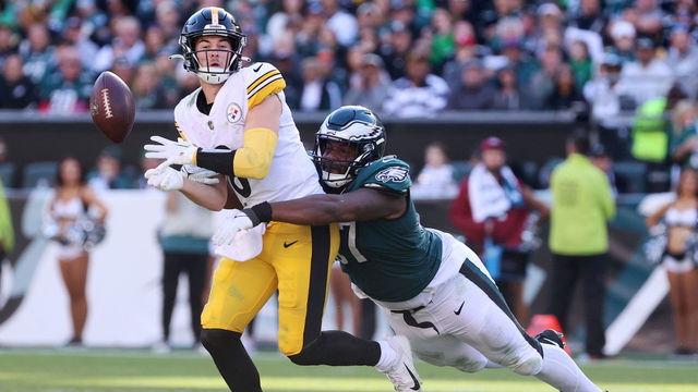 PHILADELPHIA, PENNSYLVANIA - OCTOBER 30: Javon Hargrave #97 of the Philadelphia Eagles forces a fumble from Kenny Pickett #8 of the Pittsburgh Steelers in the fourth quarter at Lincoln Financial Field on October 30, 2022 in Philadelphia, Pennsylvania.