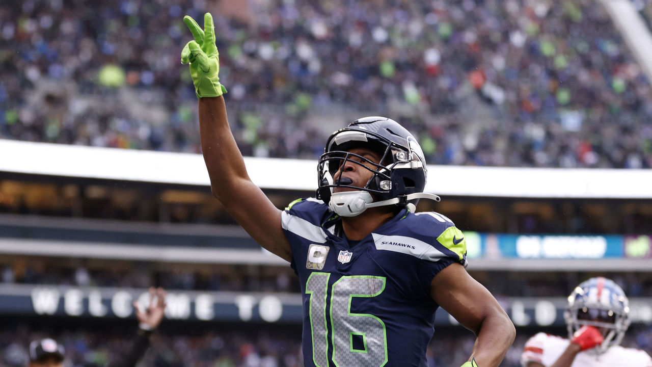 SEATTLE, WASHINGTON - OCTOBER 30: Tyler Lockett #16 of the Seattle Seahawks celebrates a touchdown against Adoree' Jackson #22 of the New York Giants during the fourth quarter at Lumen Field on October 30, 2022 in Seattle, Washington.