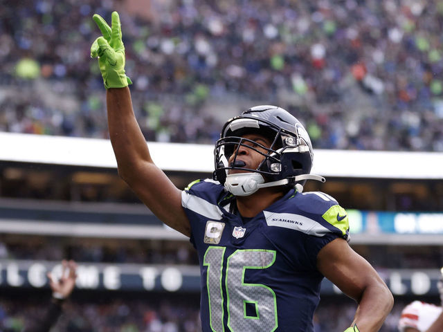SEATTLE, WASHINGTON - OCTOBER 30: Tyler Lockett #16 of the Seattle Seahawks celebrates a touchdown against Adoree' Jackson #22 of the New York Giants during the fourth quarter at Lumen Field on October 30, 2022 in Seattle, Washington.