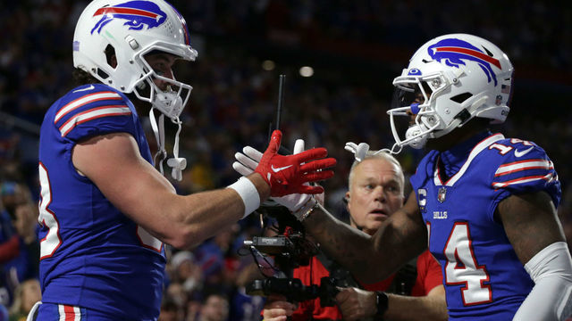 ORCHARD PARK, NEW YORK - OCTOBER 30: Dawson Knox #88 of the Buffalo Bills celebrates after scoring a touchdown during the first quarter against the Green Bay Packers at Highmark Stadium on October 30, 2022 in Orchard Park, New York.