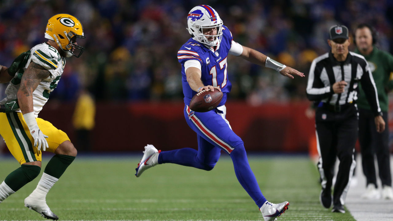 ORCHARD PARK, NEW YORK - OCTOBER 30: Josh Allen #17 of the Buffalo Bills rushes during the second half against the Green Bay Packers at Highmark Stadium on October 30, 2022 in Orchard Park, New York.