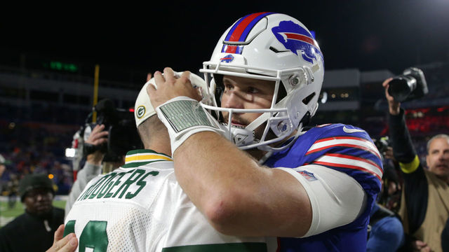 ORCHARD PARK, NEW YORK - OCTOBER 30: Josh Allen #17 of the Buffalo Bills and Aaron Rodgers #12 of the Green Bay Packers talk after their game at Highmark Stadium on October 30, 2022 in Orchard Park, New York.