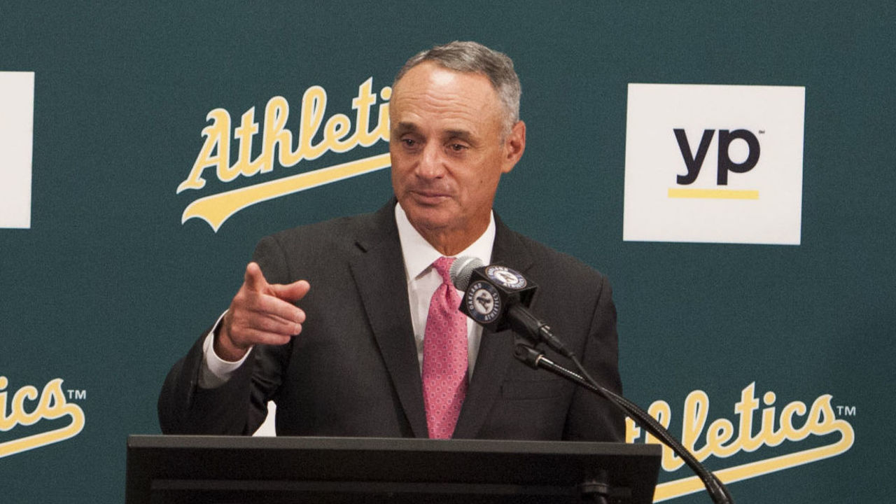 OAKLAND, CA - JUNE 19: Major League Baseball Commissioner Rob Manfred talks with reporters in the Oakland Raiders locker room before the Angels' game against the Oakland Athletics at o.co Coliseum Friday night. / //ADDITIONAL INFO: angels.0620.kjs --- Photo by KEVIN SULLIVAN / Orange County Register -- 6/19/15 The Los Angeles Angels take on the Oakland Athletics at o.co Coliseum Friday night. 6/19/15