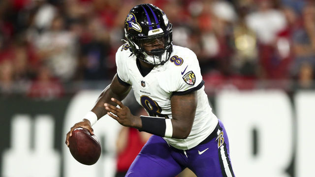 TAMPA, FL - OCTOBER 27: Lamar Jackson #8 of the Baltimore Ravens scrambles out of the pocket during the second quarter of an NFL football game against the Tampa Bay Buccaneers at Raymond James Stadium on October 27, 2022 in Tampa, Florida.