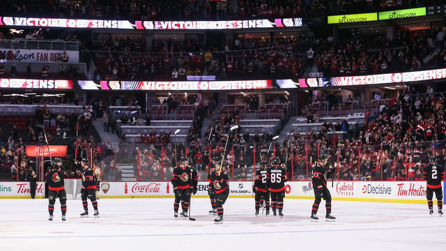 OTTAWA, CANADA - OCTOBER 18: The Ottawa Senators salute the crowd following a 7-5 win against the Boston Bruins at Canadian Tire Centre on October 18, 2022 in Ottawa, Ontario, Canada.