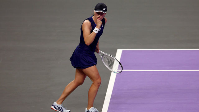 FORT WORTH, TEXAS - NOVEMBER 01: Iga Swiatek of Poland celebrates after defeating Daria Kasatkina of Russia in their Women's Singles Group Stage match during the 2022 WTA Finals, part of the Hologic WTA Tour, at Dickies Arena on November 01, 2022 in Fort Worth, Texas.