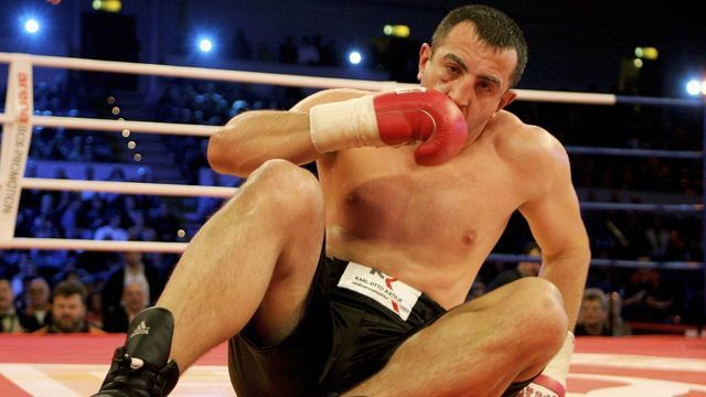 HAMBURG, GERMANY - DECEMBER 15: Goran Gogic of Germany ends up on the floor in the Heavyweight fight against Pedro Carrion during the Arena Boxing Night at the Alterdorfer Sporthalle on December 15, 2006 in Hamburg, Germany.