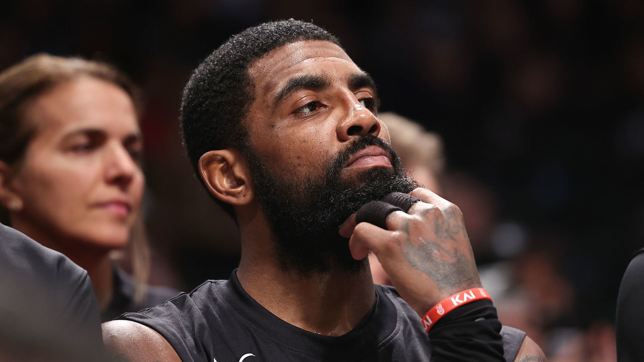 NEW YORK, NEW YORK - OCTOBER 31: Kyrie Irving #11 of the Brooklyn Nets looks on from the bench during the third quarter of the game against the Indiana Pacers at Barclays Center on October 31, 2022 in New York City.