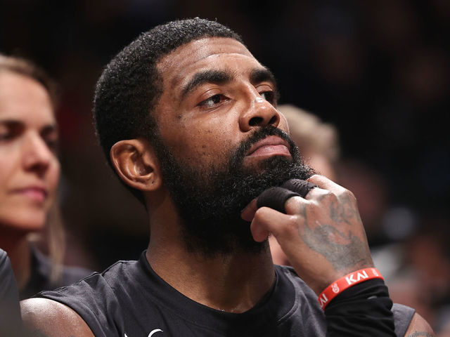 NEW YORK, NEW YORK - OCTOBER 31: Kyrie Irving #11 of the Brooklyn Nets looks on from the bench during the third quarter of the game against the Indiana Pacers at Barclays Center on October 31, 2022 in New York City.