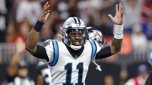 ATLANTA, GA - OCTOBER 30: PJ Walker #11 of the Carolina Panthers appeals to referees for a touchdown call during the second half against the Atlanta Falcons at Mercedes-Benz Stadium on October 30, 2022 in Atlanta, Georgia.