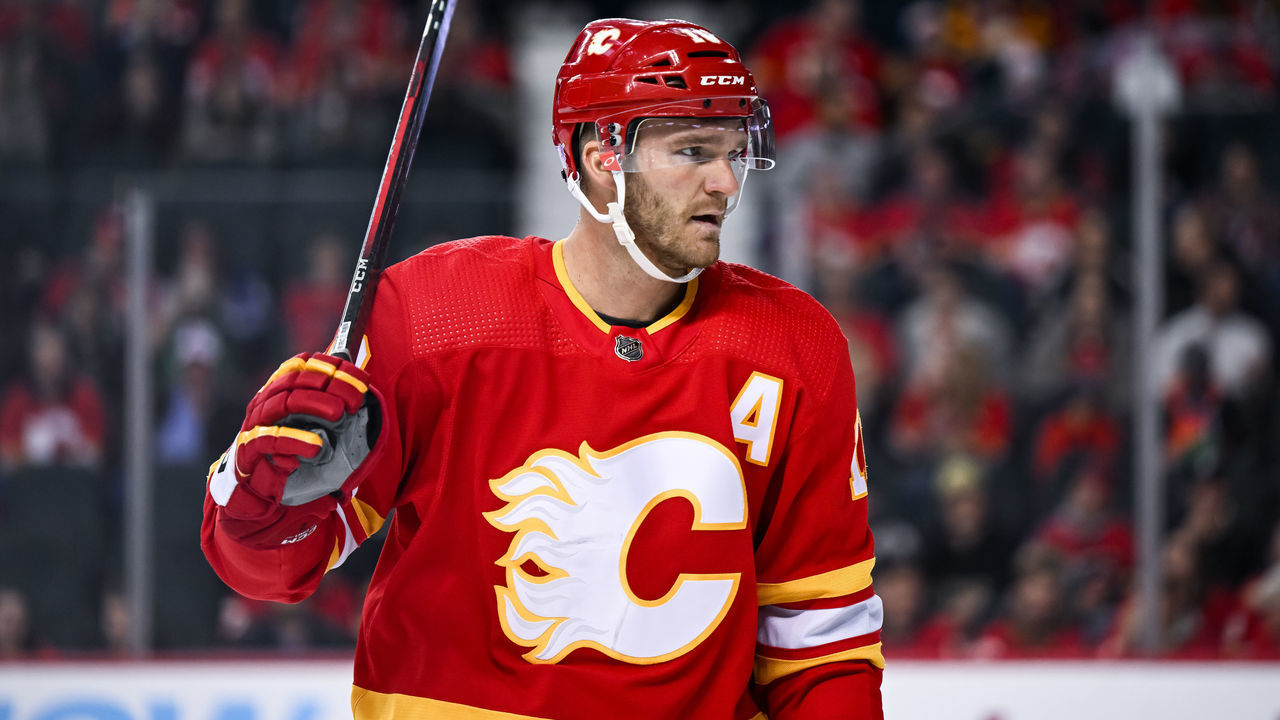 CALGARY, AB - NOVEMBER 01: Calgary Flames Left Wing Jonathan Huberdeau (10) looks on after taking a high stick during the first period of an NHL game between the Calgary Flames and the Seattle Kraken on November 1, 2022, at the Scotiabank Saddledome in Calgary, AB.