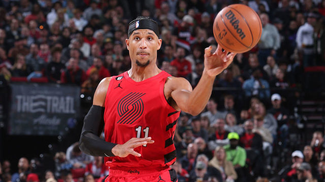 PORTLAND, OR - NOVEMBER 2: Josh Hart #11 of the Portland Trail Blazers passes the ball against the Memphis Grizzlies on November 2, 2022 at the Moda Center Arena in Portland, Oregon. Mandatory Copyright Notice: Copyright 2022 NBAE