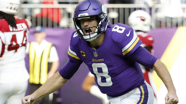 MINNEAPOLIS, MINNESOTA - OCTOBER 30: Kirk Cousins #8 of the Minnesota Vikings celebrates a touchdown during the second half against the Arizona Cardinals at U.S. Bank Stadium on October 30, 2022 in Minneapolis, Minnesota.