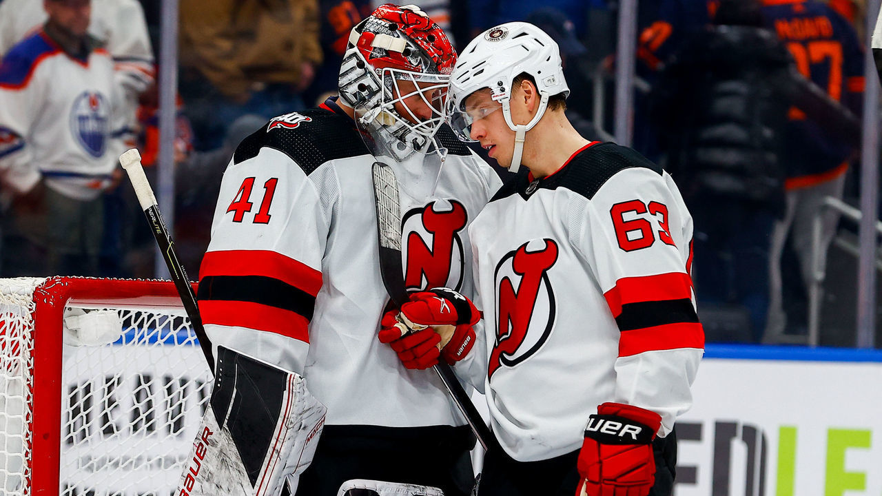 EDMONTON, AB - NOVEMBER 3 New Jersey Devils Goalie Vitek Vanecek (41) celebrates a win with New Jersey Devils Right Wing Jesper Bratt (63) in the third period during the Edmonton Oilers game versus the New Jersey Devils on November 3, 2022 at Rogers Place in Edmonton, AB.