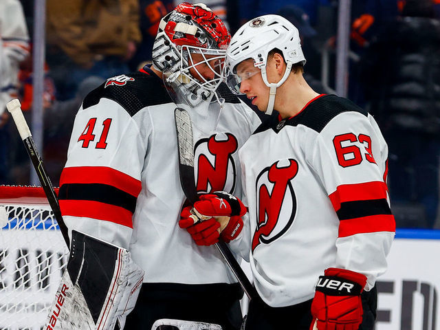EDMONTON, AB - NOVEMBER 3 New Jersey Devils Goalie Vitek Vanecek (41) celebrates a win with New Jersey Devils Right Wing Jesper Bratt (63) in the third period during the Edmonton Oilers game versus the New Jersey Devils on November 3, 2022 at Rogers Place in Edmonton, AB.