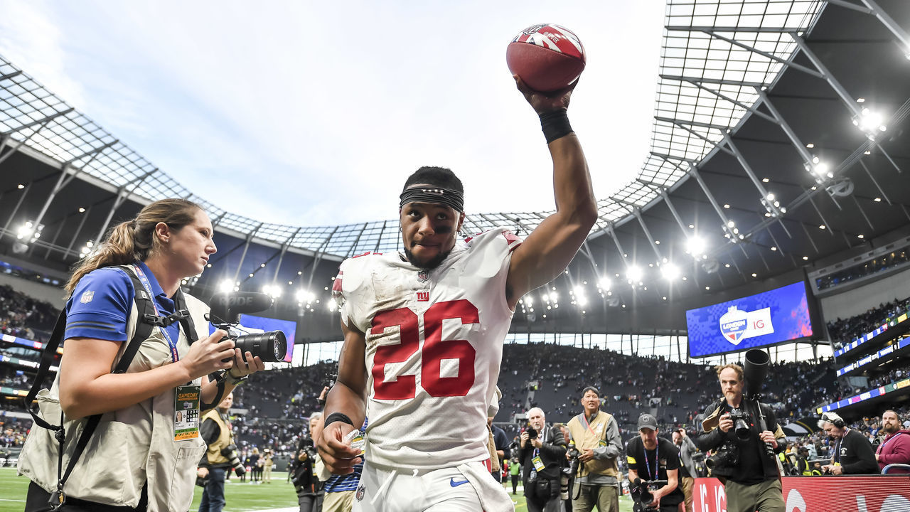 LONDON, ENGLAND - OCTOBER 09: Saquon Barkley of New York Giants celebrates after winning after the NFL match between New York Giants and Green Bay Packers at Tottenham Hotspur Stadium on October 9, 2022 in London, England.