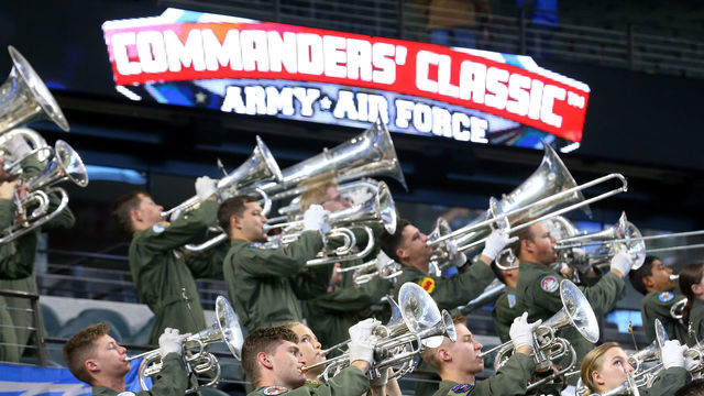 ARLINGTON, TEXAS - NOVEMBER 06: The Air Force band warms up before the start of the Commanders Classic at Globe Life Field on November 06, 2021 in Arlington, Texas.