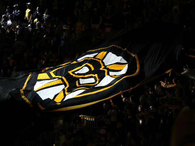 BOSTON, MASSACHUSETTS - MAY 06: A flag with the Boston Bruins logo is moved by fans before Game Three of the First Round of the 2022 Stanley Cup Playoffs at TD Garden on May 06, 2022 in Boston, Massachusetts.