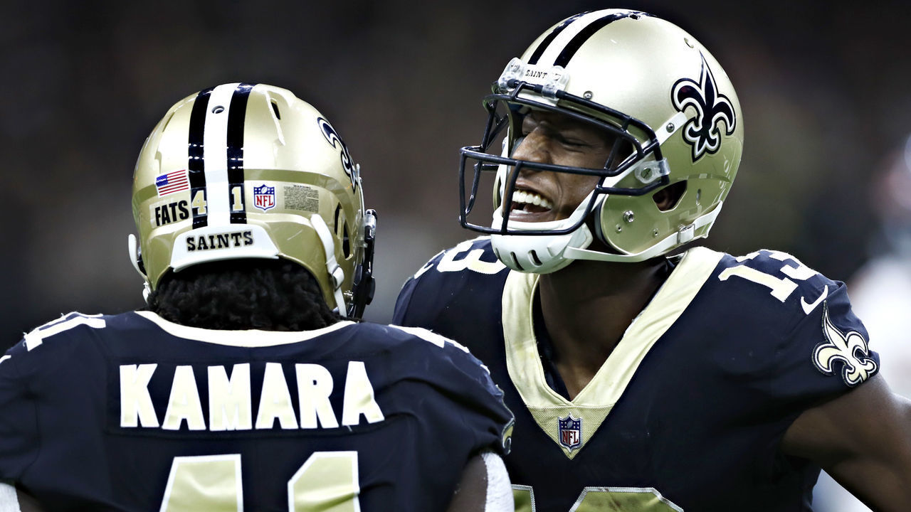 NEW ORLEANS, LA - OCTOBER 29: Alvin Kamara #41 and Michael Thomas #13 of the New Orleans Saints celebrate after a big catch by Kamara during a game against the Chicago Bears at Mercedes-Benz Superdome on October 29, 2017 in New Orleans, Louisiana. The Saints defeated the Bears 20-12.