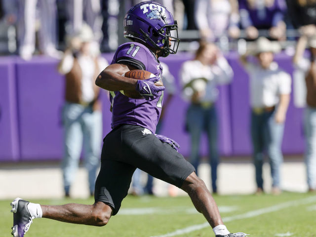 FORT WORTH, TX - NOVEMBER 05: TCU Horned Frogs wide receiver Derius Davis (11) returns a punt during the game between the TCU Horned Frogs and the Texas Tech Red Raiders on November 5, 2022 at Amon G. Carter Stadium in Fort Worth, Texas.
