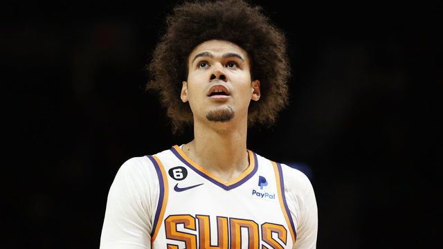PORTLAND, OREGON - OCTOBER 21: Cameron Johnson #23 of the Phoenix Suns looks on during the second quarter against the Portland Trail Blazers at Moda Center on October 21, 2022 in Portland, Oregon.